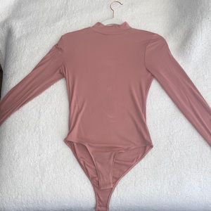 NWOT pink mock neck body suit - S